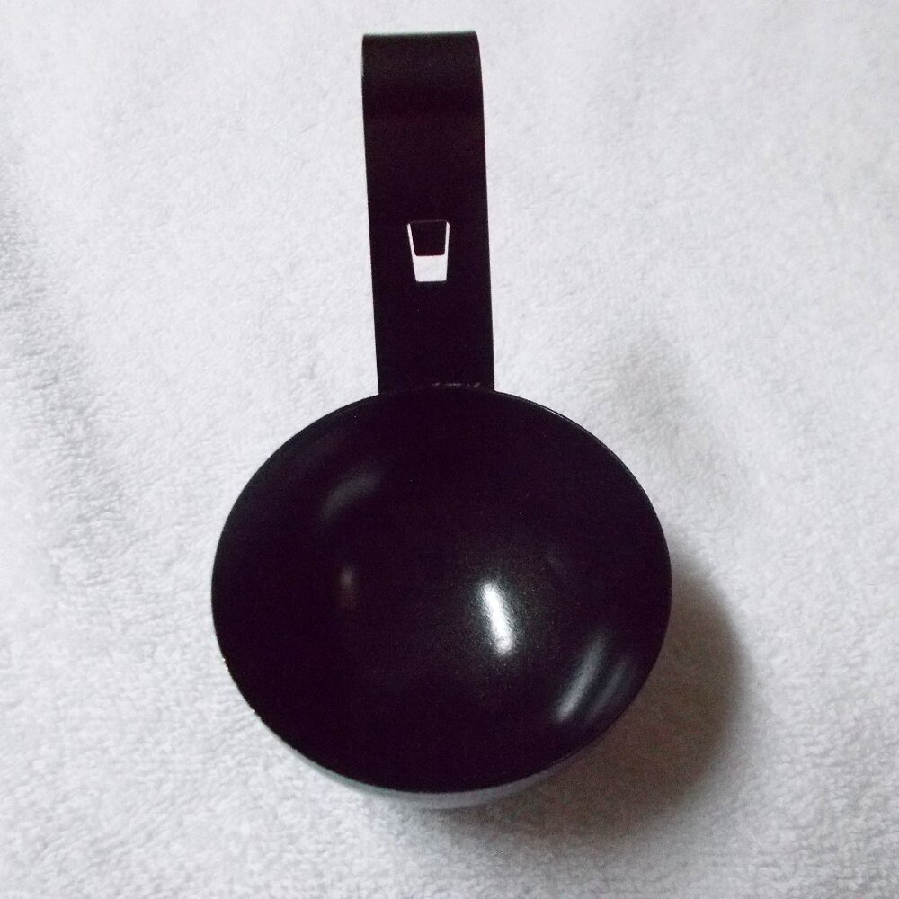 Black teflon coated egg poacher
